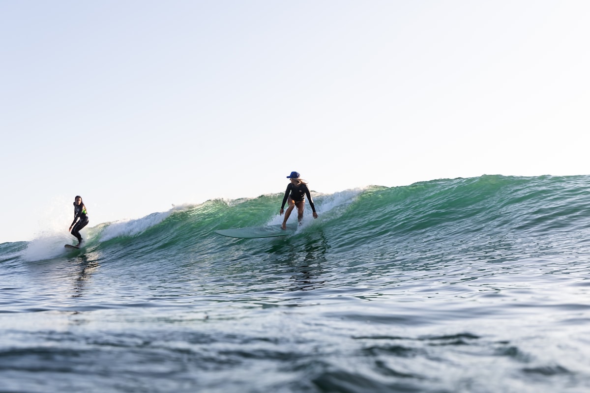 A clean, peeling artificial wave breaking down the line in a surf park